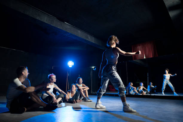 What role does body language play in conveying authenticity on stage?
